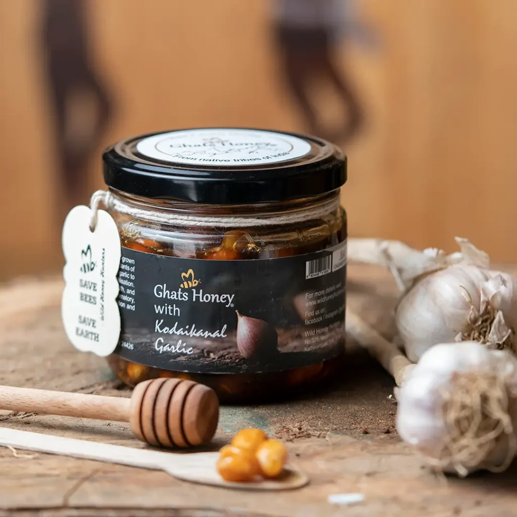 garlic honey bottle in natural backround with kodaikanal garlic