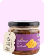 Ghats Honey with Jackfruit in a glass jar, showing ripe jackfruit pieces in wild honey, purple label, and "Save Bees Save Earth" tag.