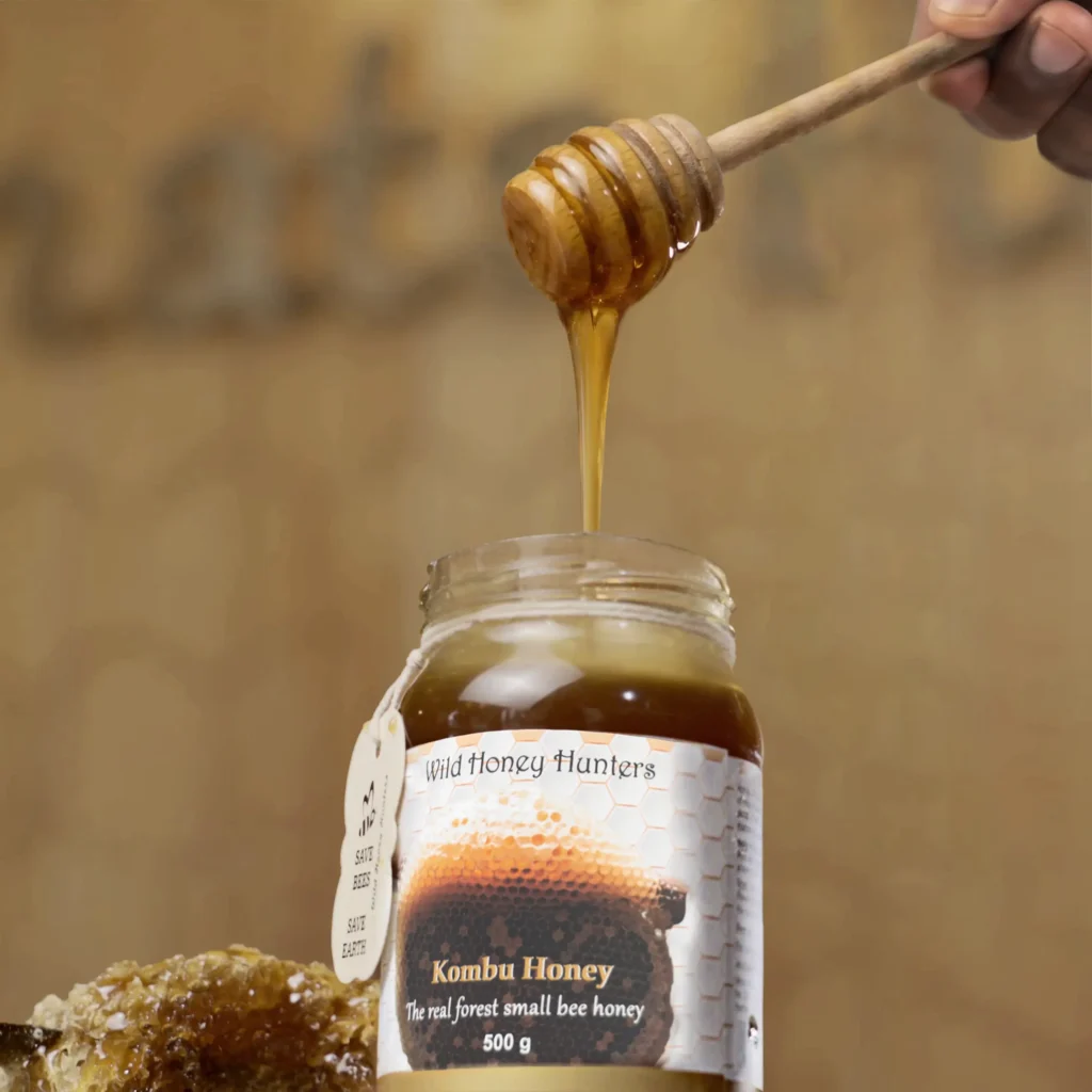 Wild honey in a glass jar with honeycomb, displaying its natural golden color, rich texture, and purity.